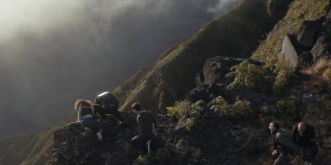 Rescuers climbing a steep misty ridge in Réunion Island's mountains – OPJ Season 4 Bianca