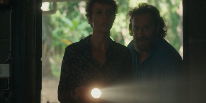 Woman and man entering a dark building with a torch – OPJ Season 6 Forbidden Fruit