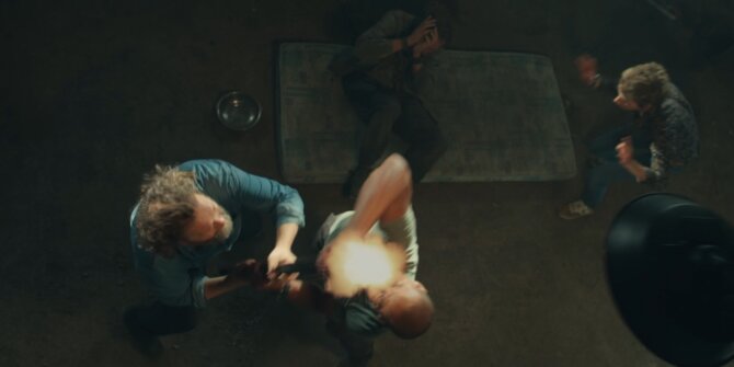 Top shot of a struggle and a gunshot flash on a warehouse floor – OPJ Season 6 Forbidden Fruit